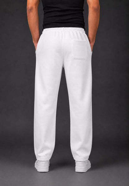 White sweatpants with a back pocket, modeled from the back on a person wearing a black shirt and white sneakers against a dark gray studio background.